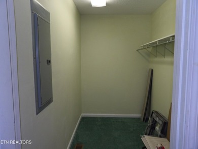 Well-maintained property featuring a 14' RV carport with hookups on Lake Tansi Village Country Club in Tennessee - for sale on GolfHomes.com, golf home, golf lot