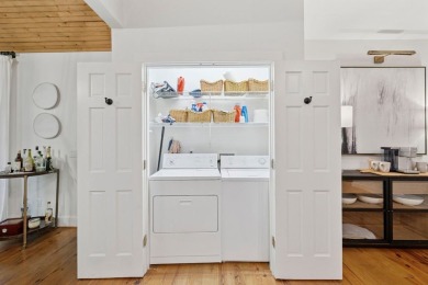This beautiful, updated home located in Sapphire Valley sits on on Sapphire National Golf Club in North Carolina - for sale on GolfHomes.com, golf home, golf lot