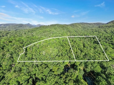 This beautiful, updated home located in Sapphire Valley sits on on Sapphire National Golf Club in North Carolina - for sale on GolfHomes.com, golf home, golf lot