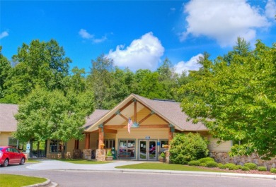 This beautiful, updated home located in Sapphire Valley sits on on Sapphire National Golf Club in North Carolina - for sale on GolfHomes.com, golf home, golf lot