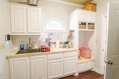 Beautifully updated in sought-after Annandale! This 3-bed on Annandale Golf Club in Mississippi - for sale on GolfHomes.com, golf home, golf lot