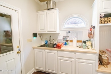 Beautifully updated in sought-after Annandale! This 3-bed on Annandale Golf Club in Mississippi - for sale on GolfHomes.com, golf home, golf lot