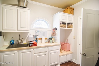 Beautifully updated in sought-after Annandale! This 3-bed on Annandale Golf Club in Mississippi - for sale on GolfHomes.com, golf home, golf lot