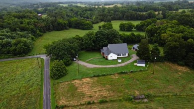 Nestled on 10.74 acres, this charming 1900s farmhouse offers on  in Tennessee - for sale on GolfHomes.com, golf home, golf lot