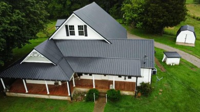 Nestled on 10.74 acres, this charming 1900s farmhouse offers on  in Tennessee - for sale on GolfHomes.com, golf home, golf lot