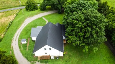 Nestled on 10.74 acres, this charming 1900s farmhouse offers on  in Tennessee - for sale on GolfHomes.com, golf home, golf lot