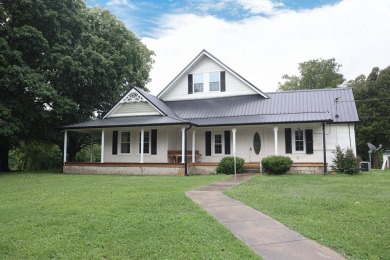 Nestled on 10.74 acres, this charming 1900s farmhouse offers on  in Tennessee - for sale on GolfHomes.com, golf home, golf lot