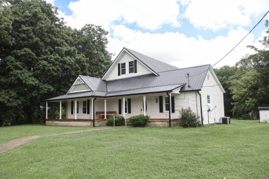 Nestled on 10.74 acres, this charming 1900s farmhouse offers on  in Tennessee - for sale on GolfHomes.com, golf home, golf lot