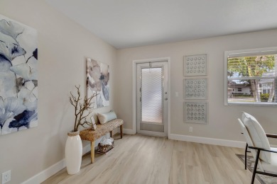 Enjoy serene water views from this fully remodeled ground-floor on Kings Point Golf - Executive in Florida - for sale on GolfHomes.com, golf home, golf lot