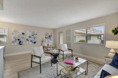 Enjoy serene water views from this fully remodeled ground-floor on Kings Point Golf - Executive in Florida - for sale on GolfHomes.com, golf home, golf lot
