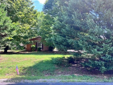 Welcome to resort-style living in the heart of Tellico Village! on Toqua Golf Course - Loudon County in Tennessee - for sale on GolfHomes.com, golf home, golf lot