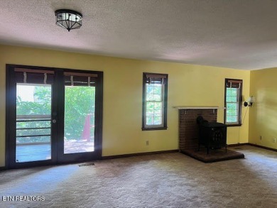 Welcome to resort-style living in the heart of Tellico Village! on Toqua Golf Course - Loudon County in Tennessee - for sale on GolfHomes.com, golf home, golf lot