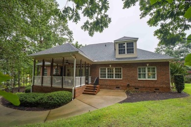 Welcome to this stunning all-brick home offering flexible living on Timberlake Country Club in South Carolina - for sale on GolfHomes.com, golf home, golf lot