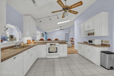 Welcome to this beautifully updated 3BR/2BA home in the on Brick Landing Plantation Yacht and Golf Club in North Carolina - for sale on GolfHomes.com, golf home, golf lot