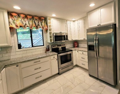 Beautifully updated 3 bed/3 bath cabin in Hide-A-Way Hills on Hide-A-Way Hills Golf Club in Ohio - for sale on GolfHomes.com, golf home, golf lot