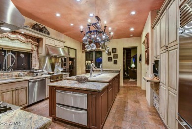 Experience luxury and ease in this rare semi-custom villa on Superstition Mountain Club - Lost Gold in Arizona - for sale on GolfHomes.com, golf home, golf lot