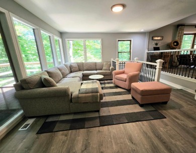 Beautifully updated 3 bed/3 bath cabin in Hide-A-Way Hills on Hide-A-Way Hills Golf Club in Ohio - for sale on GolfHomes.com, golf home, golf lot