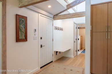 Experience refined mountain living in this beautifully remodeled on Jackson Hole Golf and Tennis Club in Wyoming - for sale on GolfHomes.com, golf home, golf lot