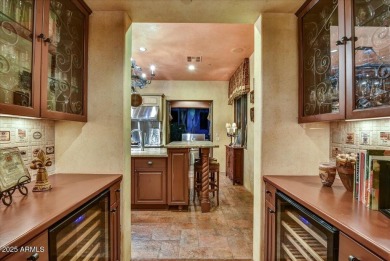 Experience luxury and ease in this rare semi-custom villa on Superstition Mountain Club - Lost Gold in Arizona - for sale on GolfHomes.com, golf home, golf lot