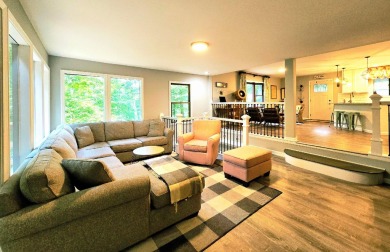 Beautifully updated 3 bed/3 bath cabin in Hide-A-Way Hills on Hide-A-Way Hills Golf Club in Ohio - for sale on GolfHomes.com, golf home, golf lot