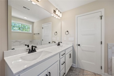 Discover your dream home where elegance meets functionality in a on Deercroft Golf and Country Club in North Carolina - for sale on GolfHomes.com, golf home, golf lot
