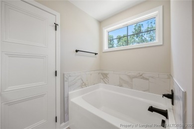 Discover your dream home where elegance meets functionality in a on Deercroft Golf and Country Club in North Carolina - for sale on GolfHomes.com, golf home, golf lot