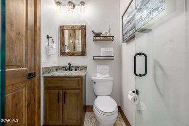 Welcome to your dream mountain retreat - a rare 6-bedroom on Headwaters Golf Course At Granby Ranch in Colorado - for sale on GolfHomes.com, golf home, golf lot