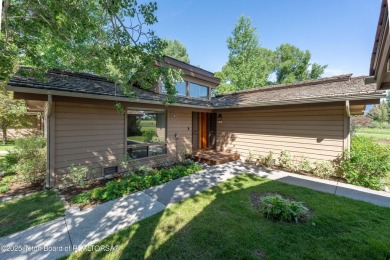 Experience refined mountain living in this beautifully remodeled on Jackson Hole Golf and Tennis Club in Wyoming - for sale on GolfHomes.com, golf home, golf lot