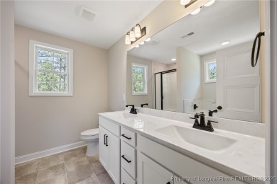 Discover your dream home where elegance meets functionality in a on Deercroft Golf and Country Club in North Carolina - for sale on GolfHomes.com, golf home, golf lot