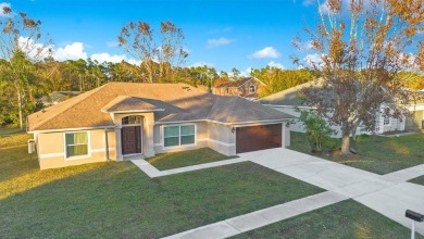 **Welcome Home** Move-in ready 3-bedroom, 1 office(can be used on Wedgefield Golf Club in Florida - for sale on GolfHomes.com, golf home, golf lot