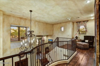 Experience luxury and ease in this rare semi-custom villa on Superstition Mountain Club - Lost Gold in Arizona - for sale on GolfHomes.com, golf home, golf lot