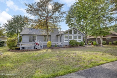 Welcome to this beautifully updated 3BR/2BA home in the on Brick Landing Plantation Yacht and Golf Club in North Carolina - for sale on GolfHomes.com, golf home, golf lot