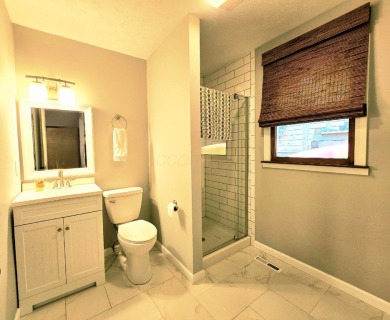Beautifully updated 3 bed/3 bath cabin in Hide-A-Way Hills on Hide-A-Way Hills Golf Club in Ohio - for sale on GolfHomes.com, golf home, golf lot