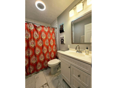 Beautifully updated 3 bed/3 bath cabin in Hide-A-Way Hills on Hide-A-Way Hills Golf Club in Ohio - for sale on GolfHomes.com, golf home, golf lot