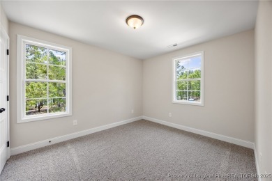 Discover your dream home where elegance meets functionality in a on Deercroft Golf and Country Club in North Carolina - for sale on GolfHomes.com, golf home, golf lot