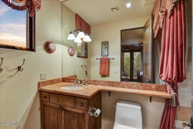 Experience luxury and ease in this rare semi-custom villa on Superstition Mountain Club - Lost Gold in Arizona - for sale on GolfHomes.com, golf home, golf lot