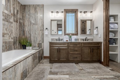 Welcome to your dream mountain retreat - a rare 6-bedroom on Headwaters Golf Course At Granby Ranch in Colorado - for sale on GolfHomes.com, golf home, golf lot