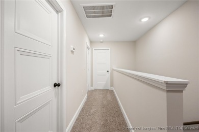 Discover your dream home where elegance meets functionality in a on Deercroft Golf and Country Club in North Carolina - for sale on GolfHomes.com, golf home, golf lot