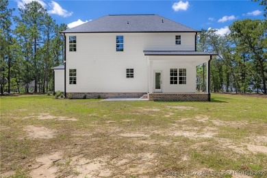 Discover your dream home where elegance meets functionality in a on Deercroft Golf and Country Club in North Carolina - for sale on GolfHomes.com, golf home, golf lot