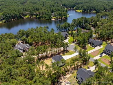 Discover your dream home where elegance meets functionality in a on Deercroft Golf and Country Club in North Carolina - for sale on GolfHomes.com, golf home, golf lot