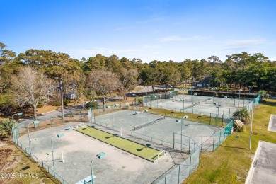 Welcome to this beautifully updated 3BR/2BA home in the on Brick Landing Plantation Yacht and Golf Club in North Carolina - for sale on GolfHomes.com, golf home, golf lot