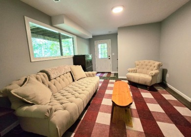Beautifully updated 3 bed/3 bath cabin in Hide-A-Way Hills on Hide-A-Way Hills Golf Club in Ohio - for sale on GolfHomes.com, golf home, golf lot