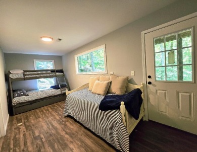 Beautifully updated 3 bed/3 bath cabin in Hide-A-Way Hills on Hide-A-Way Hills Golf Club in Ohio - for sale on GolfHomes.com, golf home, golf lot