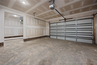 Discover your dream home where elegance meets functionality in a on Deercroft Golf and Country Club in North Carolina - for sale on GolfHomes.com, golf home, golf lot