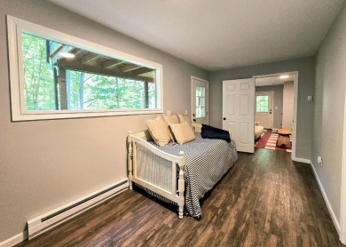Beautifully updated 3 bed/3 bath cabin in Hide-A-Way Hills on Hide-A-Way Hills Golf Club in Ohio - for sale on GolfHomes.com, golf home, golf lot