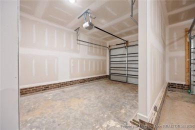 Discover your dream home where elegance meets functionality in a on Deercroft Golf and Country Club in North Carolina - for sale on GolfHomes.com, golf home, golf lot