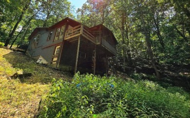 Beautifully updated 3 bed/3 bath cabin in Hide-A-Way Hills on Hide-A-Way Hills Golf Club in Ohio - for sale on GolfHomes.com, golf home, golf lot
