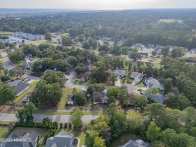 Welcome to this beautifully updated 3BR/2BA home in the on Brick Landing Plantation Yacht and Golf Club in North Carolina - for sale on GolfHomes.com, golf home, golf lot