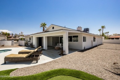 Welcome to 2341 Green Place, an exquisitely remodeled four on London Bridge Golf Course in Arizona - for sale on GolfHomes.com, golf home, golf lot