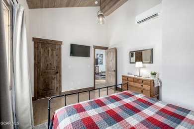 Welcome to your dream mountain retreat - a rare 6-bedroom on Headwaters Golf Course At Granby Ranch in Colorado - for sale on GolfHomes.com, golf home, golf lot